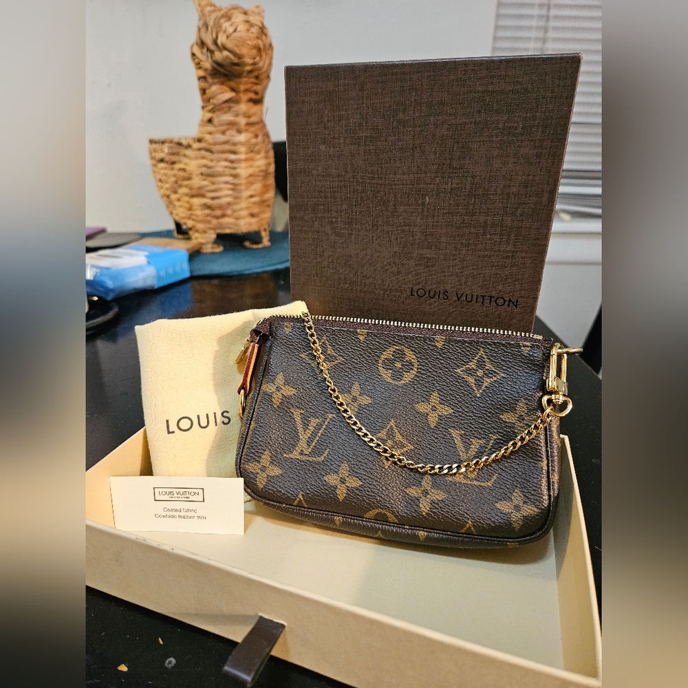 SOLD Louis Vuitton Mini Pochette Accessoires Mint Clutch Wristlet